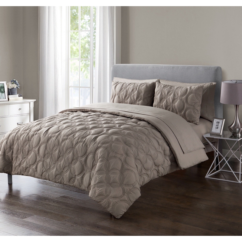 taupe embossed bed in a big 7 piece set